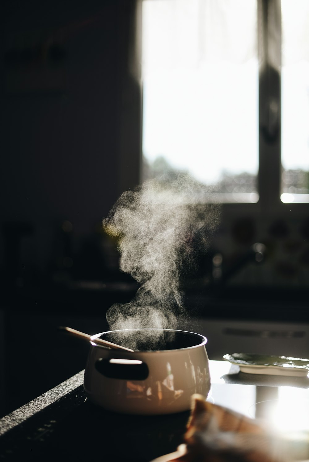 Cooks prepping ingredients in a restaurant kitchen